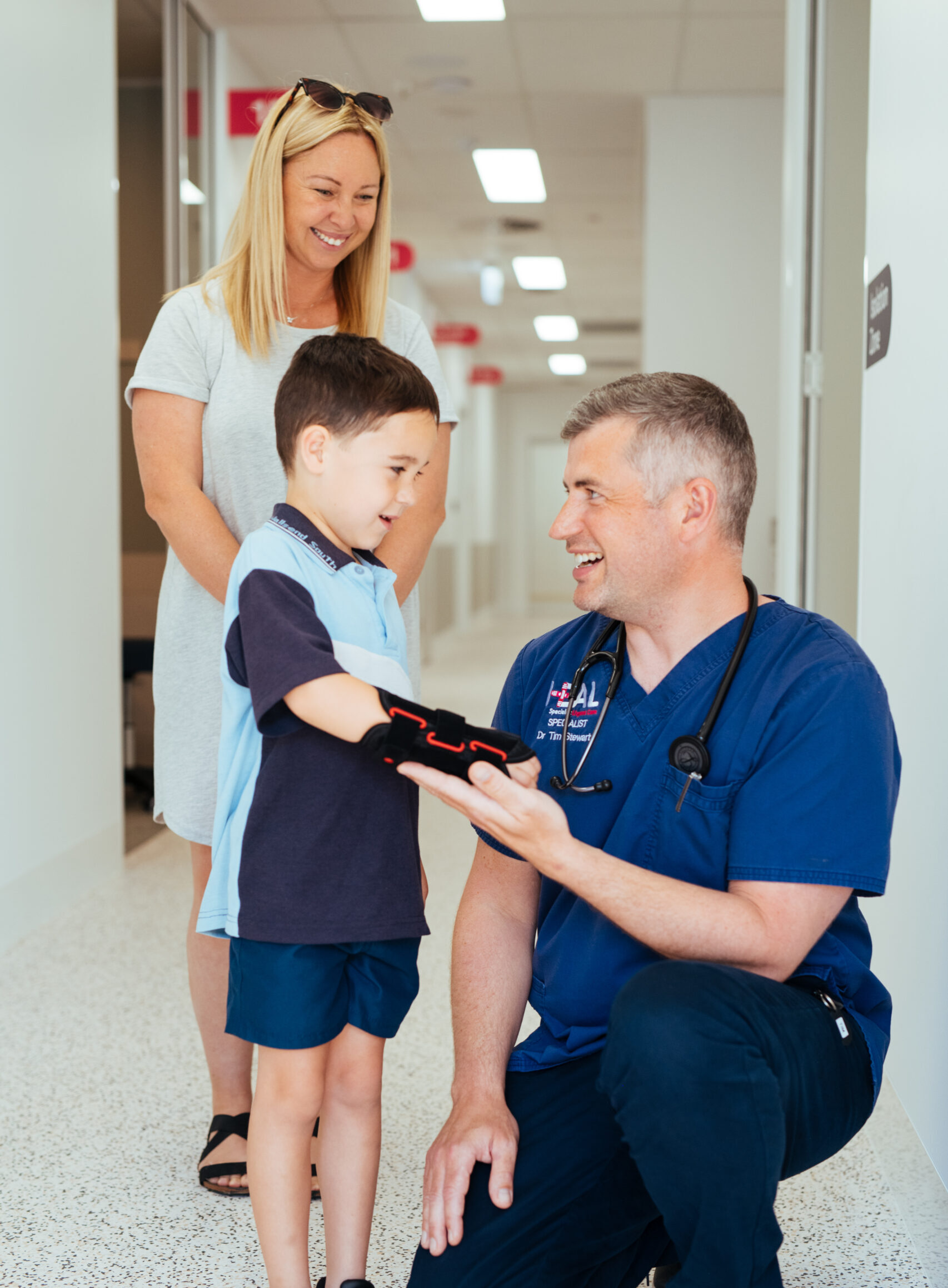 doctor with child and mum