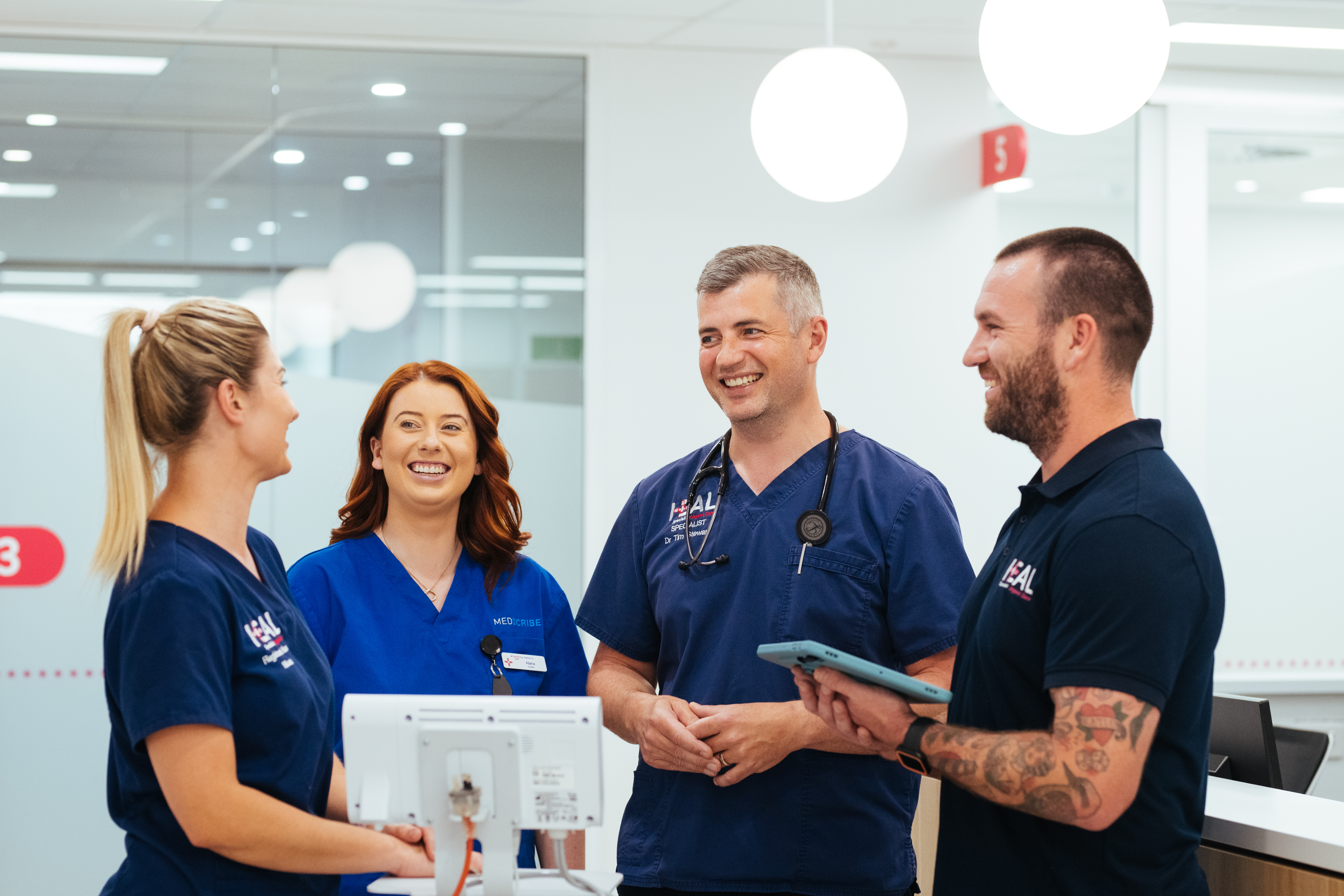 Four doctors talking